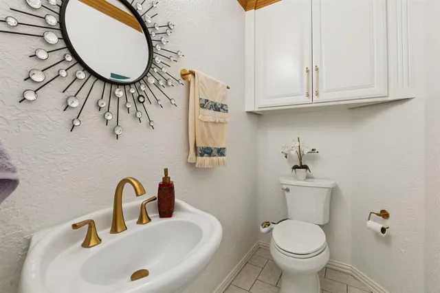 a view of a livingroom with furniture and a window
