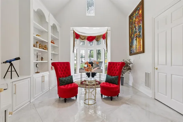 a living room with furniture and rug