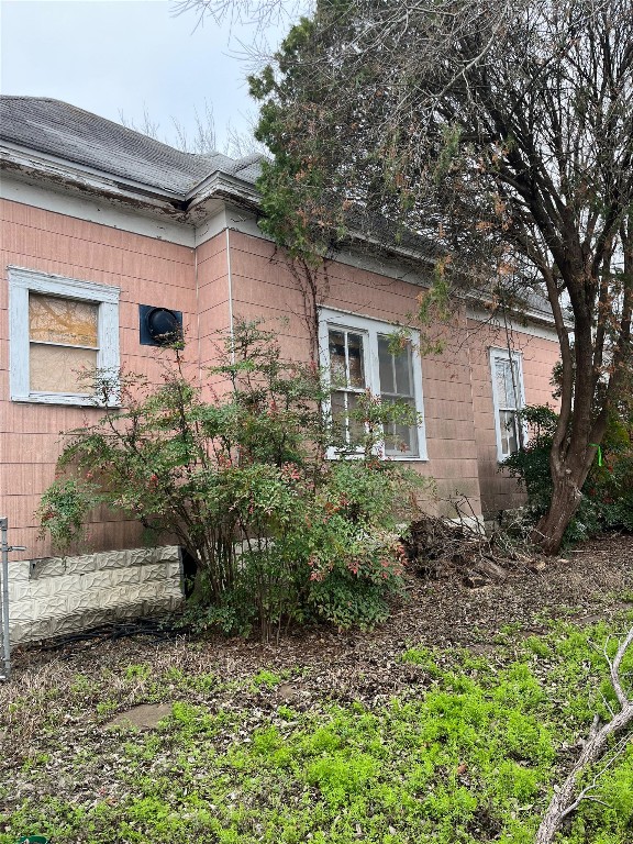 620 Washburn Street Taylor, TX 76574 - Photo 11 of 14 a front view of a house with garden