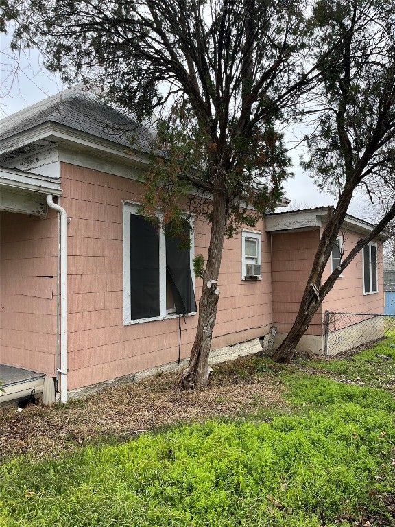 620 Washburn Street Taylor, TX 76574 - Photo 2 of 14 a view of a house with a tree bath