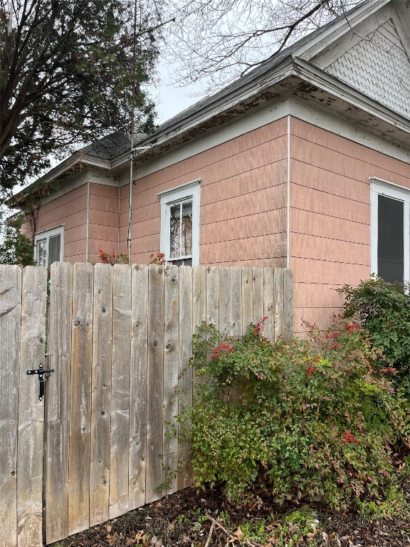 620 Washburn Street Taylor, TX 76574 - Photo 10 of 14 a view of a backyard with plants