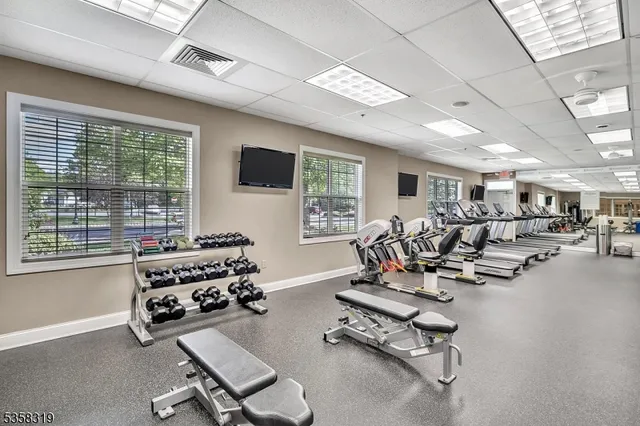a view of a house with sitting area and garden