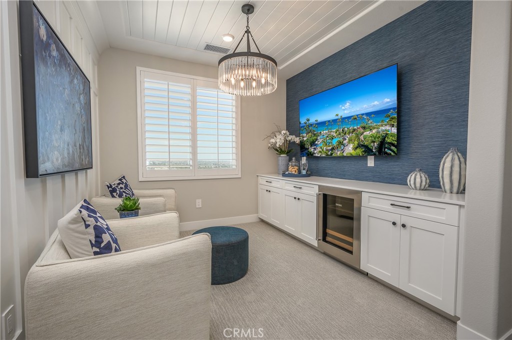 13093 Edgware Drive Rancho Cucamonga, CA 91739 - Photo 13 of 25 a living room with furniture a window and flat screen tv