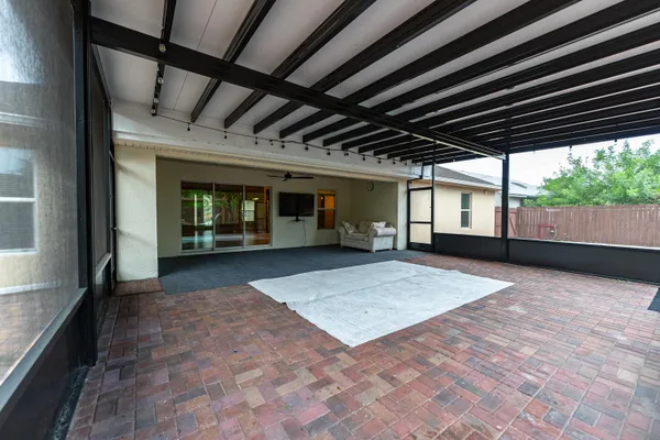 a view of backyard with cabin