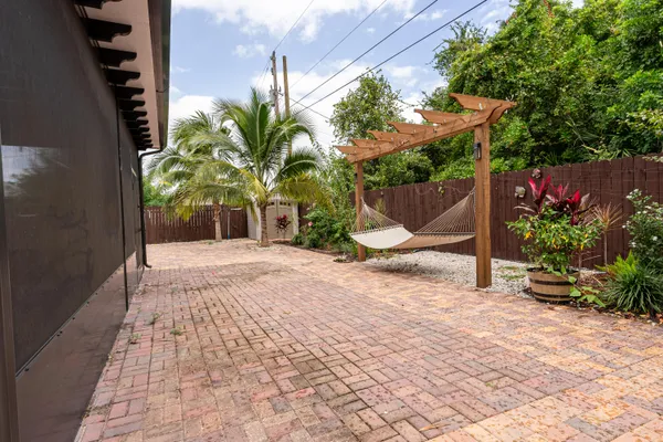 a view of a backyard with plants
