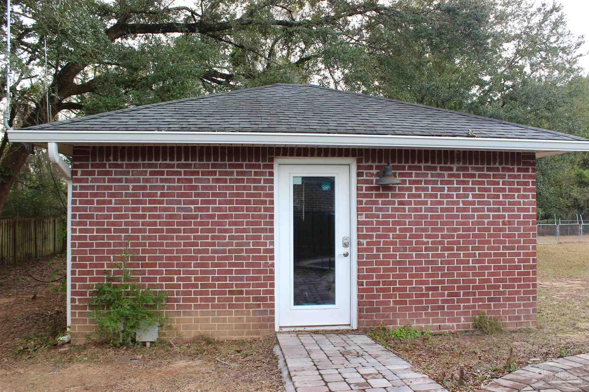 6295 Billoree Road Pace, FL 32571 - Photo 4 of 50 Separate electric panel, wall AC, 2 year old door