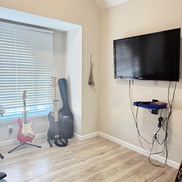 588 Freemans Walk Stone Mountain, GA 30083 - Photo 24 of 25 a living room with furniture and a flat screen tv