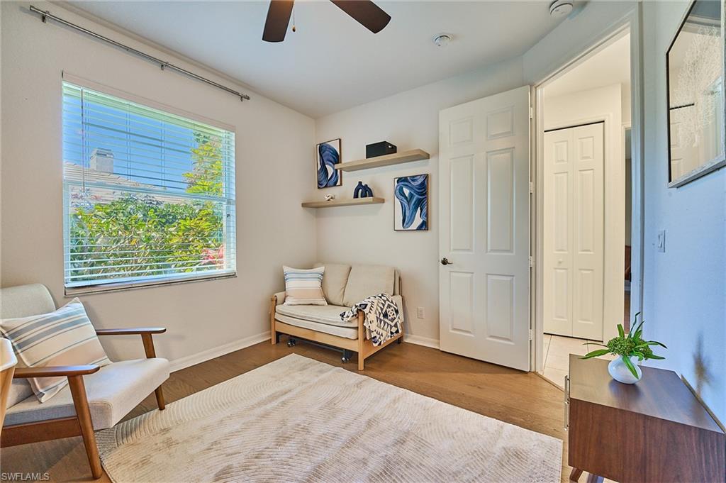 186 Muirfield Circle Naples, FL 34113 - Photo 23 of 36 a bedroom with furniture and a window