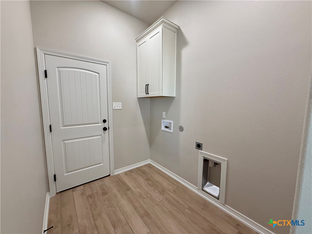 203 Lasso Loop Lorena, TX 76655 - Photo 23 of 37 a view of empty room with wooden floor