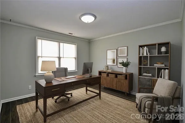 a workspace with furniture and window