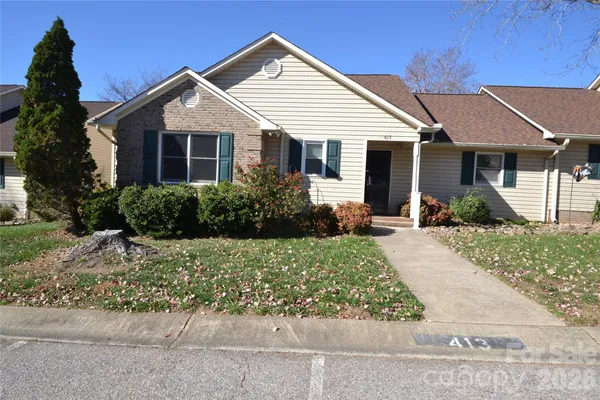 front view of a house and a yard