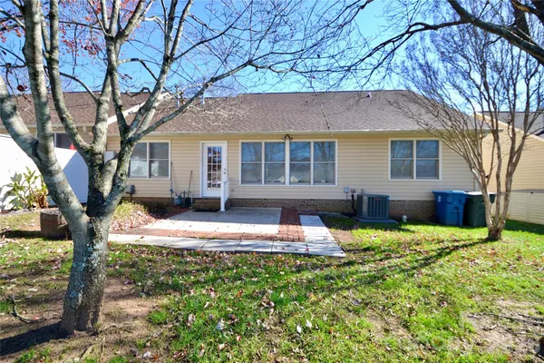 a house view with a garden space