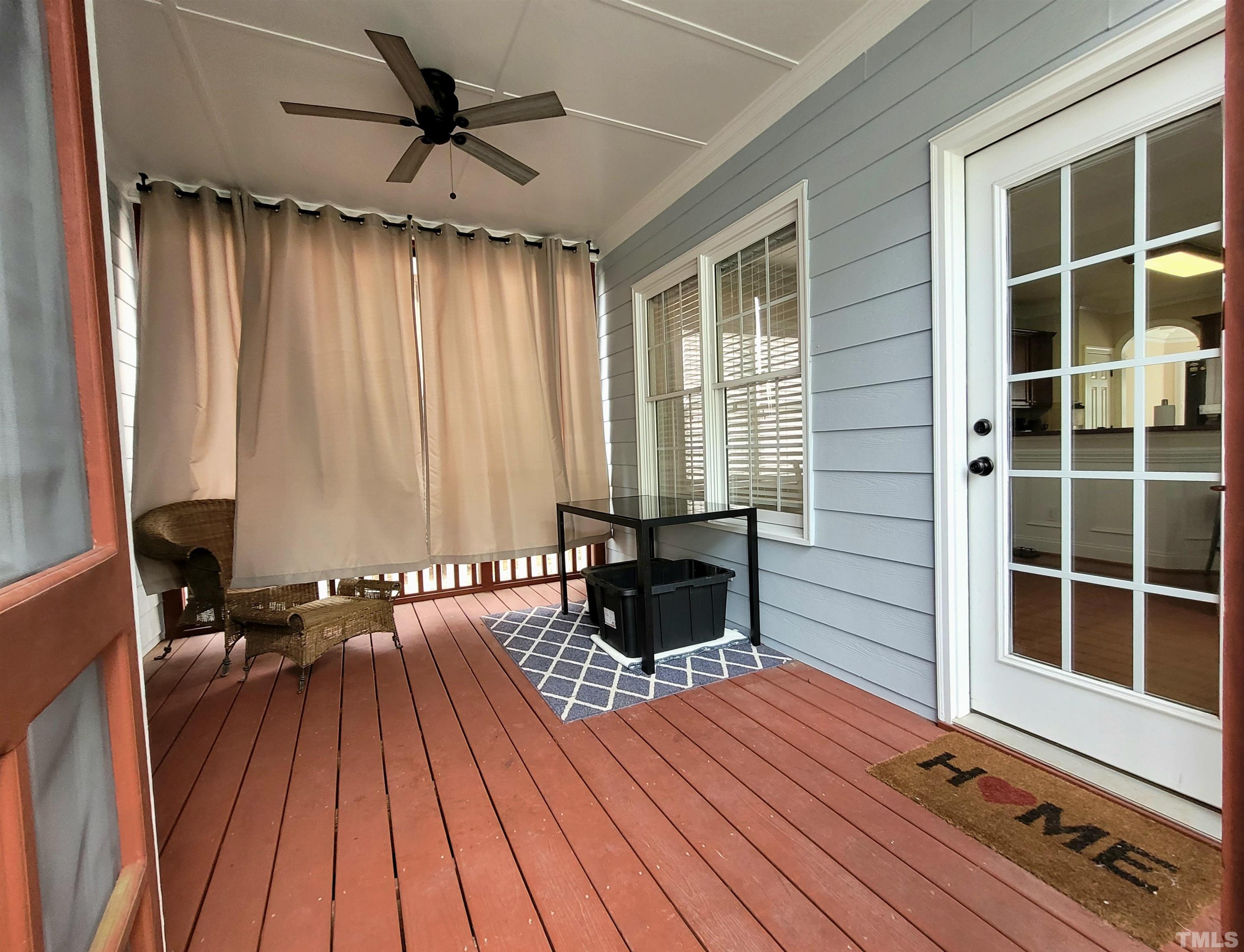 411 Magdala Place Apex, NC 27502 - Photo 28 of 29 a view of sitting area with furniture and a rug