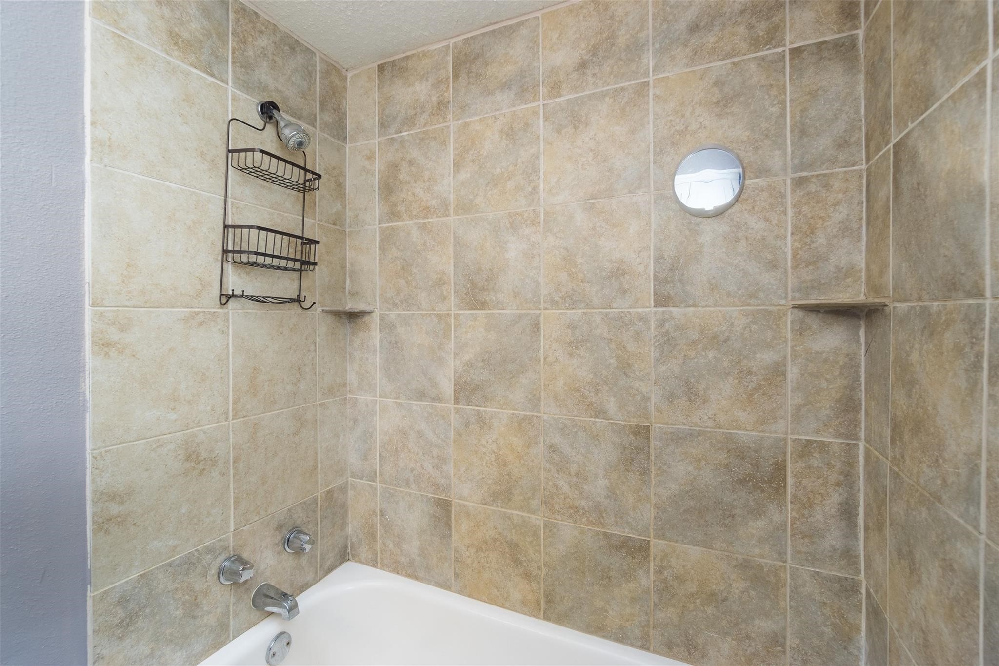 4604 South Tower Road Santa Fe, TX 77517 - Photo 18 of 28 a bathroom with a shower