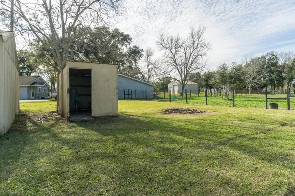 a view of backyard with green space