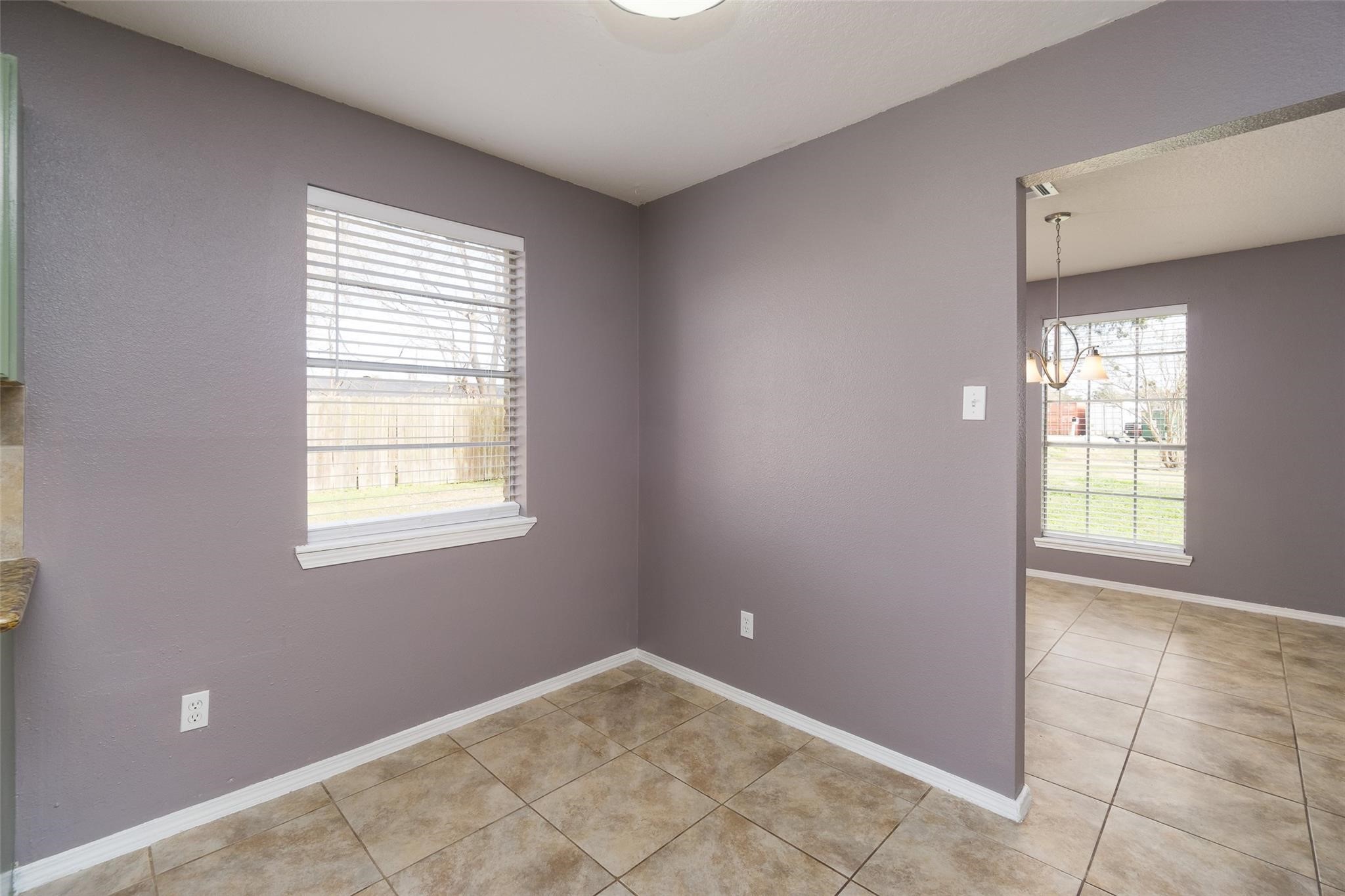 4604 South Tower Road Santa Fe, TX 77517 - Photo 7 of 28 an empty room with windows and closet