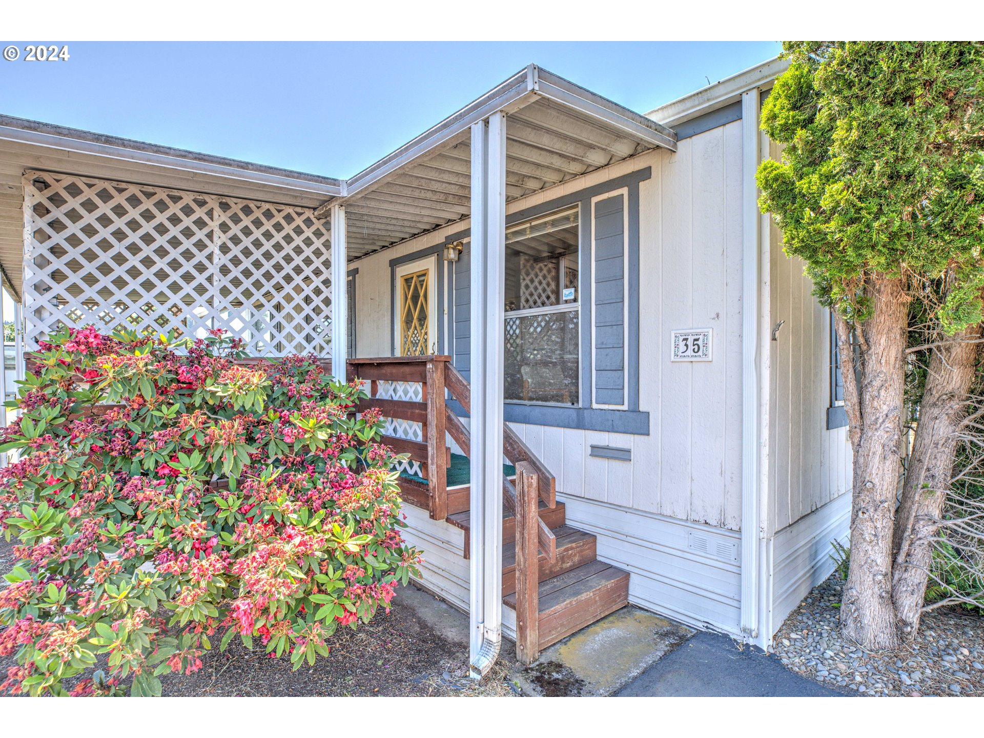 19605 River Road Gladstone, OR 97027 - Photo 7 of 21 a view front of house with an outdoor space