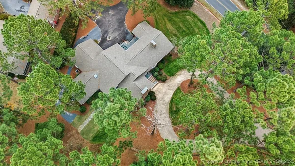 an aerial view of residential house with outdoor space