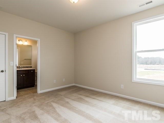 4138 Davis Meadow Street Raleigh, NC 27616 - Photo 22 of 25 a view of an empty room and window