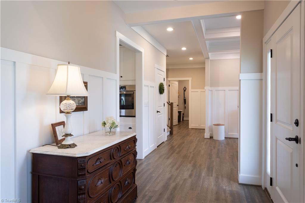 393 Scout Road Lexington, NC 27292 - Photo 5 of 47 View from the foyer area, looking down to the right. The door all the way on the end is the laundry room. To the left is access into the kitchen. The dining room is to the right and faces the front of the home.