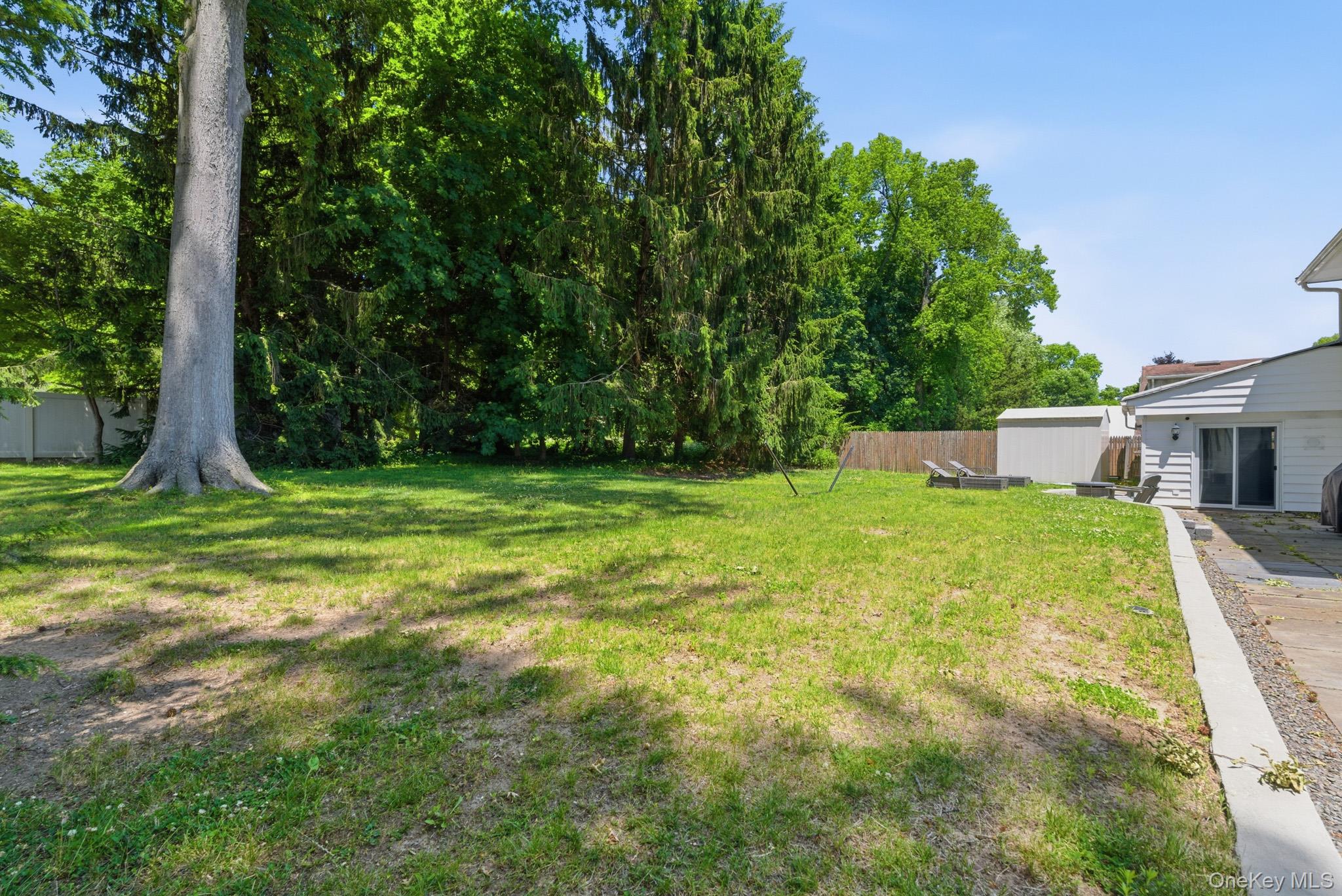 2 Bell Place Rye Brook, NY 10573 - Photo 38 of 41 Back yard with Mature Trees backs up to Crawford Park