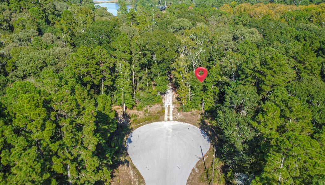 Nestled in a serene cul-de-sac, this expansive 1.8-acre wooded lot offers a perfect blend of privacy and natural beauty for your dream home.