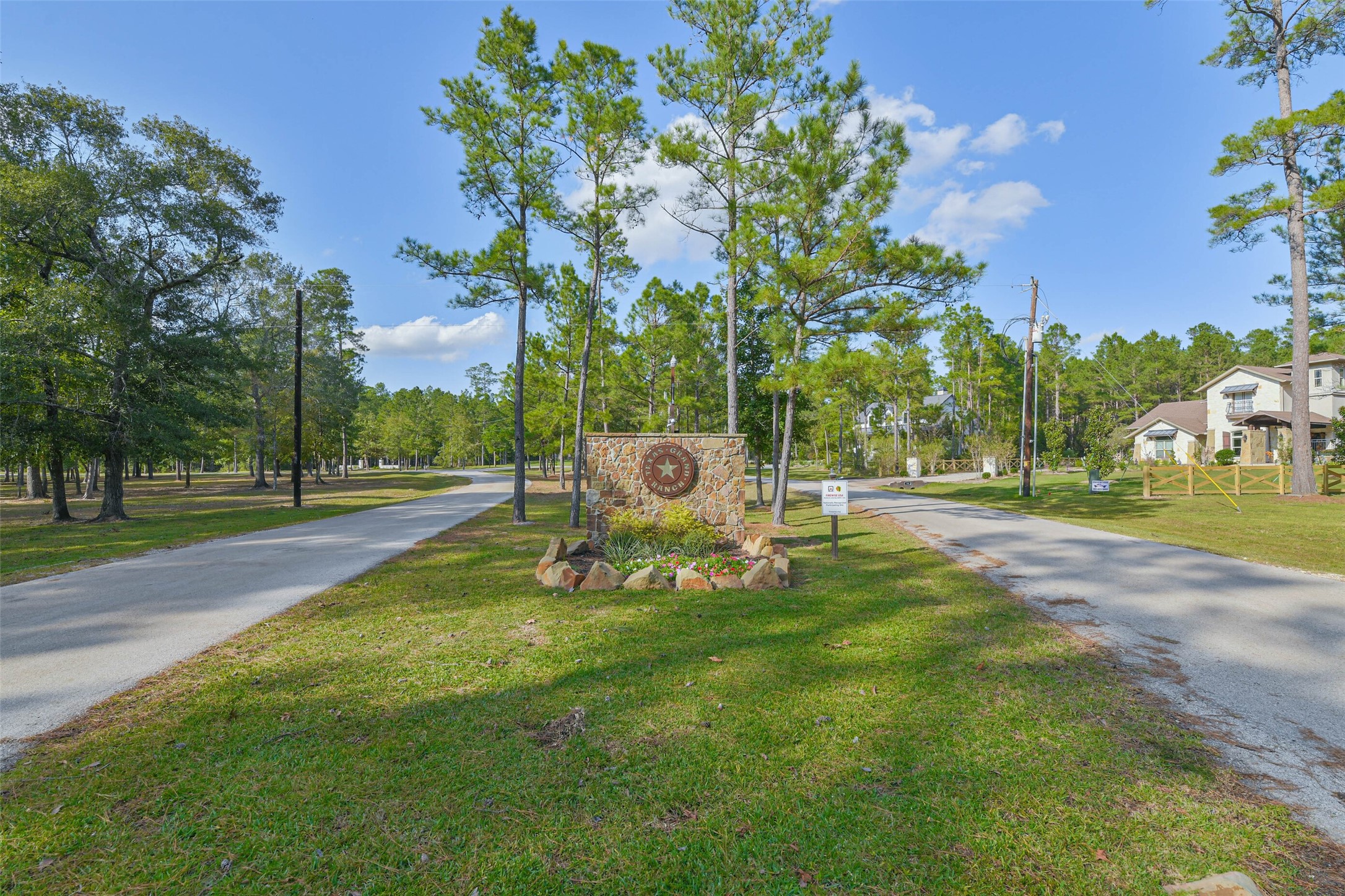 Tbd Granite Road Huntsville, TX 77340 - Photo 5 of 16 Experience serene living at Texas Grand Ranch, where lush greenery and spacious lots welcome you to your dream home amidst nature's beauty.
