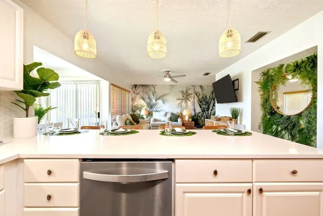 a bathroom with a sink a mirror and a window