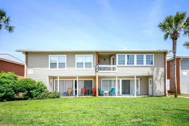 front view of a building with a yard