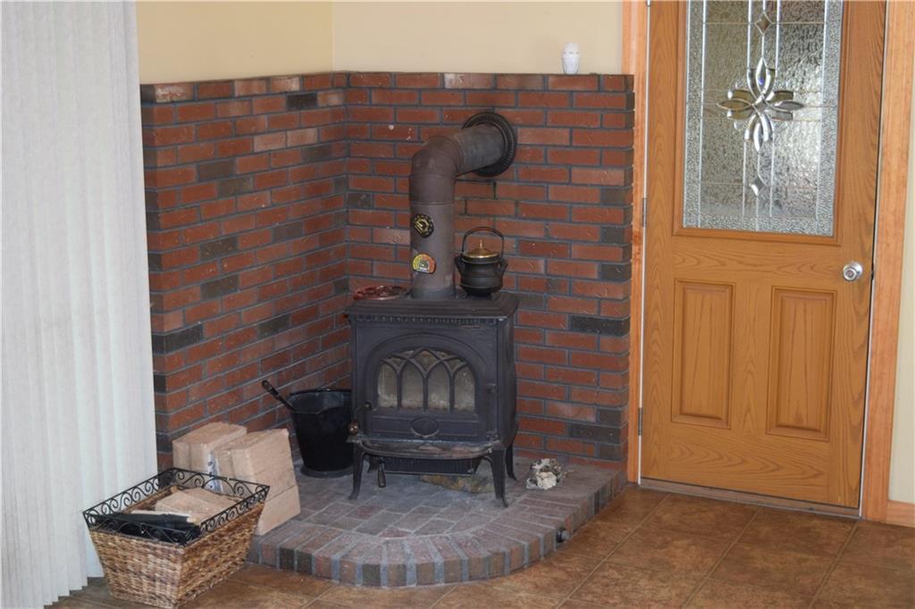 52 Loop Road Topsham, ME 04086 - Photo 7 of 35 Jotul woodstove