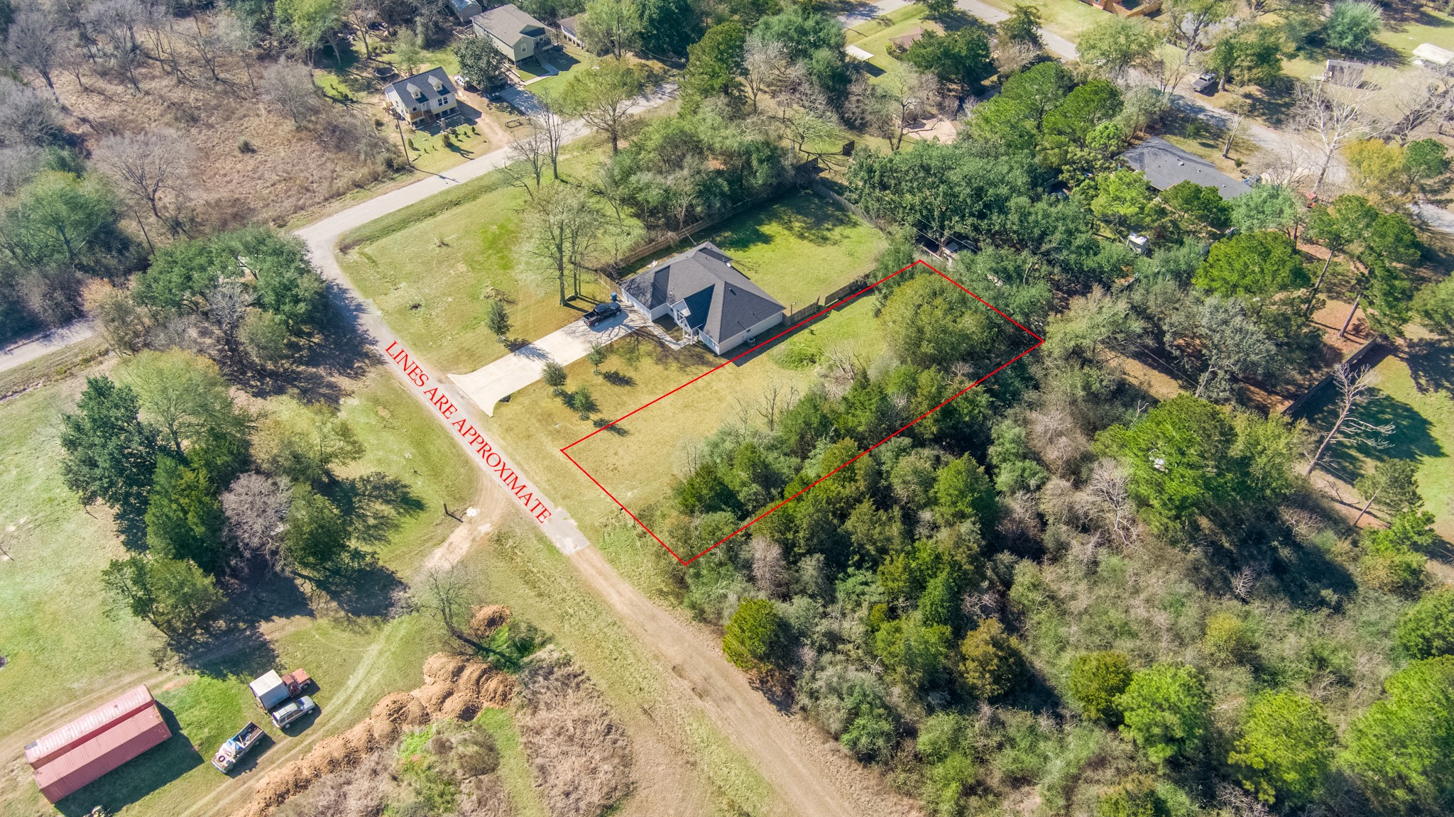 0 Pearl Street Waller, TX 77484 - Photo 7 of 8 an aerial view of a house with a yard