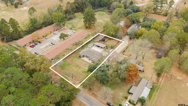 a view of balcony with a small yard
