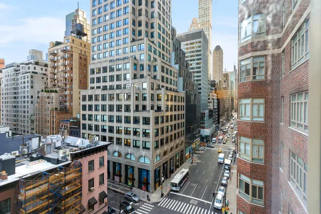 a view of a city with tall buildings