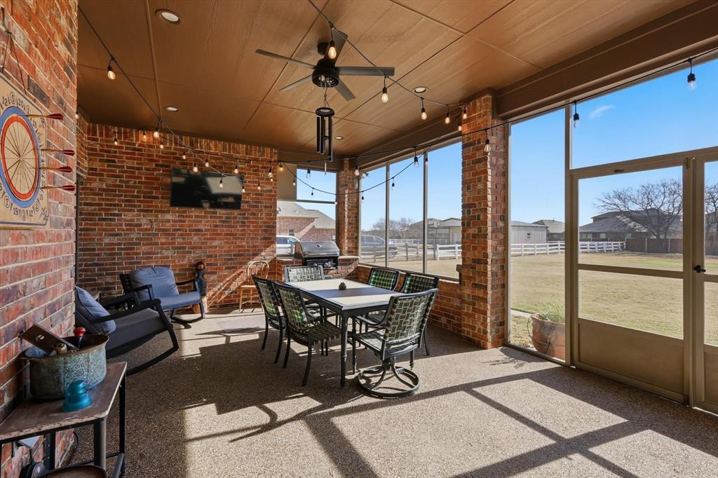209 Lonesome Prairie Trail Haslet, TX 76052 - Photo 29 of 40 a view of a dining room with furniture window and outside view
