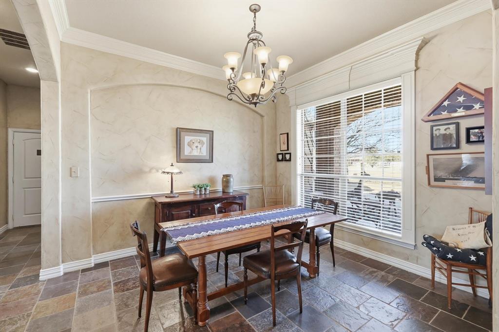 209 Lonesome Prairie Trail Haslet, TX 76052 - Photo 6 of 40 a view of a dining room with furniture window and outside view