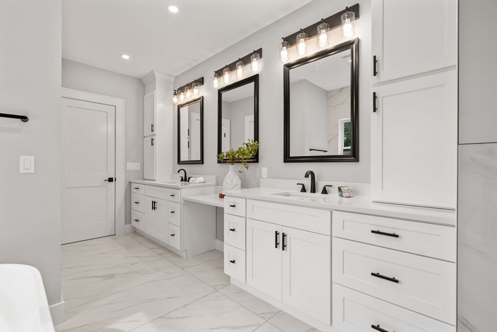 48 Cypress Road Milton, MA 02186 - Photo 22 of 39 a bathroom with a double vanity sink mirror and double