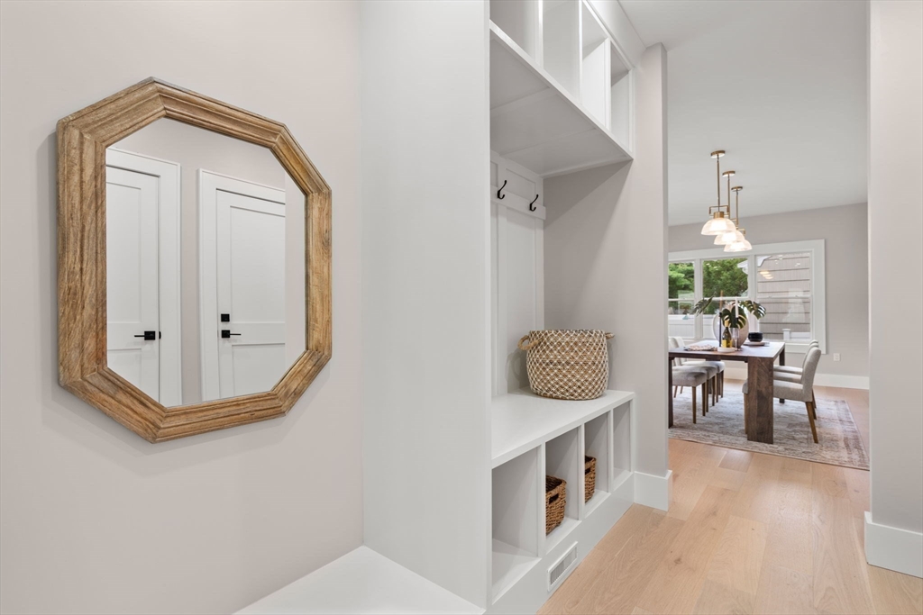 48 Cypress Road Milton, MA 02186 - Photo 30 of 39 a view of living room filled with furniture and wooden floor