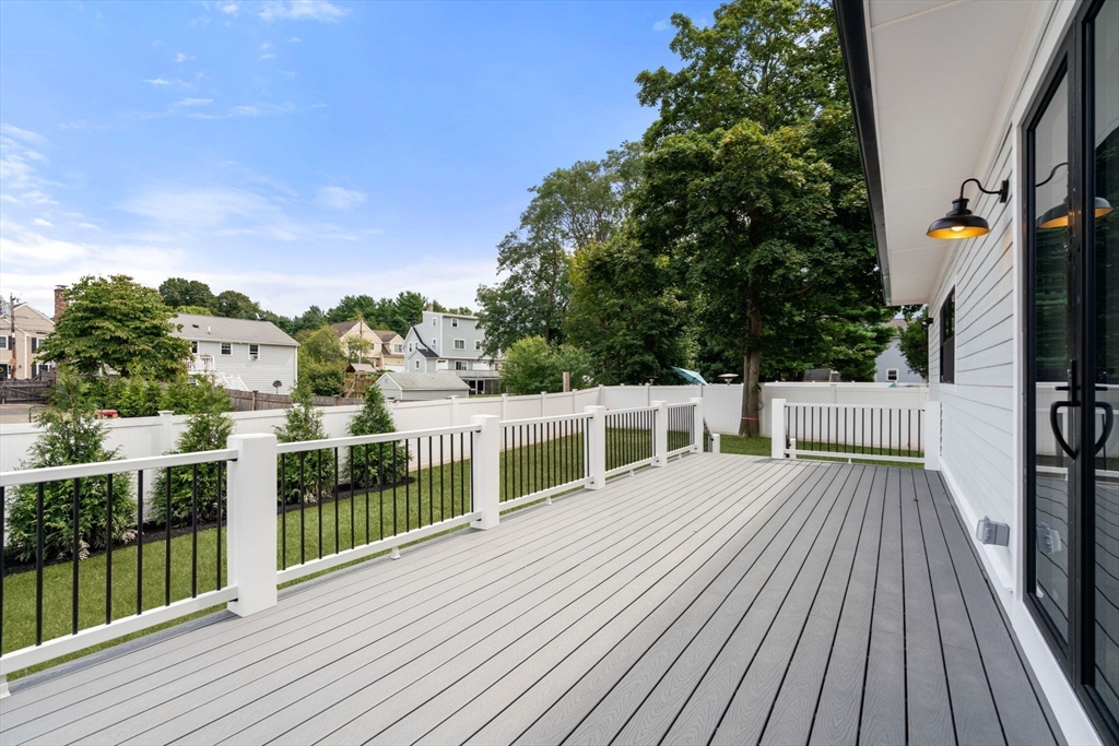 48 Cypress Road Milton, MA 02186 - Photo 35 of 39 a view of balcony with deck and wooden floor