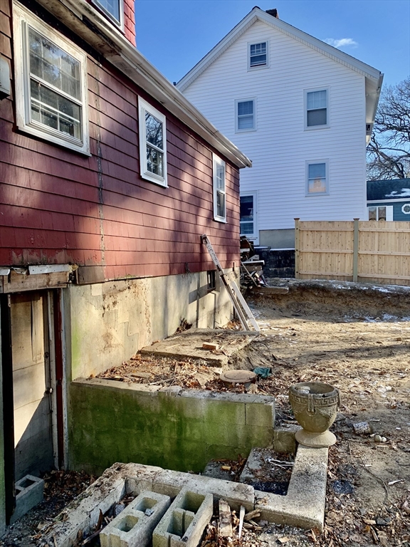 180 Dent Street Boston, MA 02132 - Photo 12 of 12 a view of a house with a patio