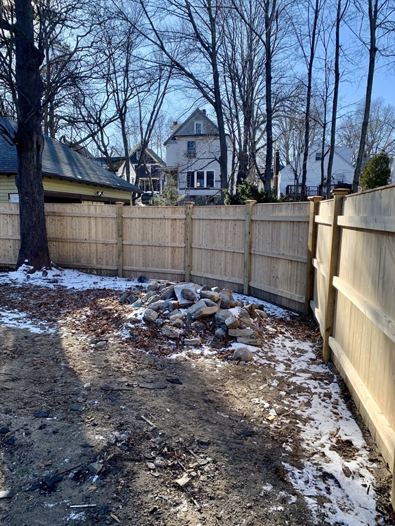 180 Dent Street Boston, MA 02132 - Photo 6 of 12 a view of a backyard of the house