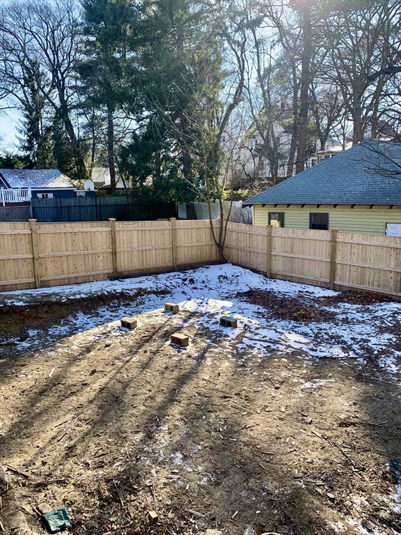 180 Dent Street Boston, MA 02132 - Photo 7 of 12 a view of a backyard