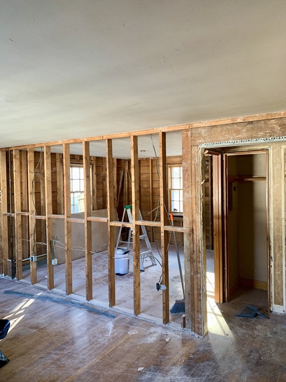 180 Dent Street Boston, MA 02132 - Photo 10 of 12 a view of a livingroom with wooden floor and outdoor space