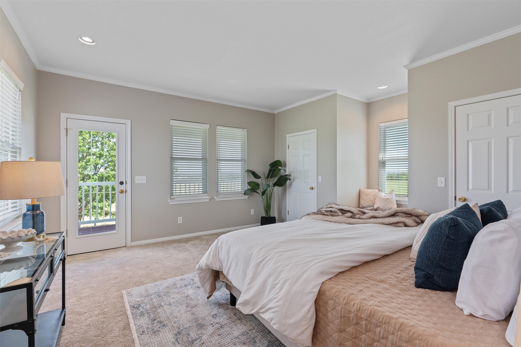 768 Upper Elgin River Road Elgin, TX 78621 - Photo 16 of 40 Primary bedroom with lots of views of land.