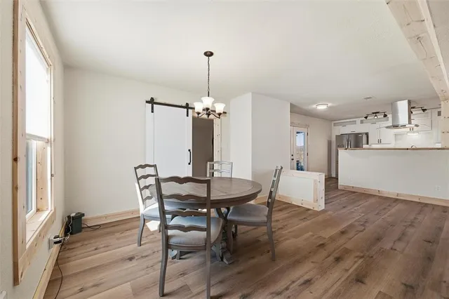 a spacious bathroom with a double vanity sink and a large mirror