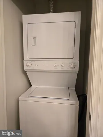 a bathroom with a bathtub and a window