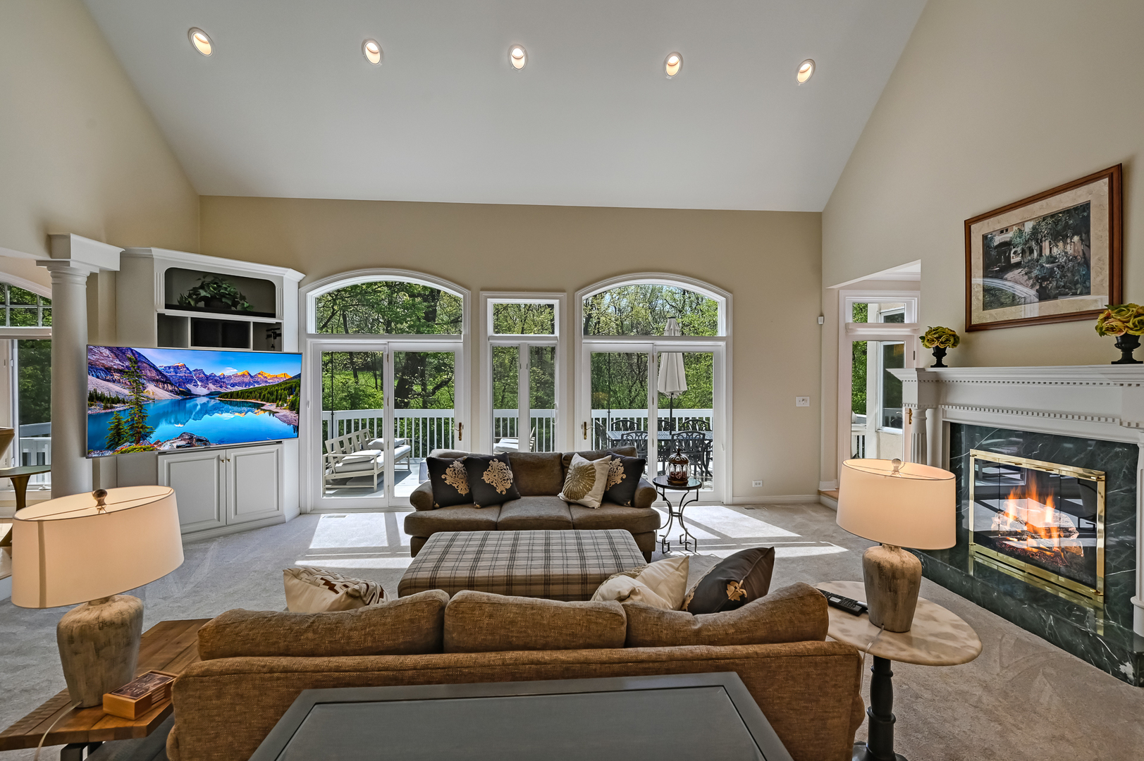 9301 Falling Waters Drive East Burr Ridge, IL 60527 - Photo 13 of 52 a living room with furniture fireplace and flat screen tv