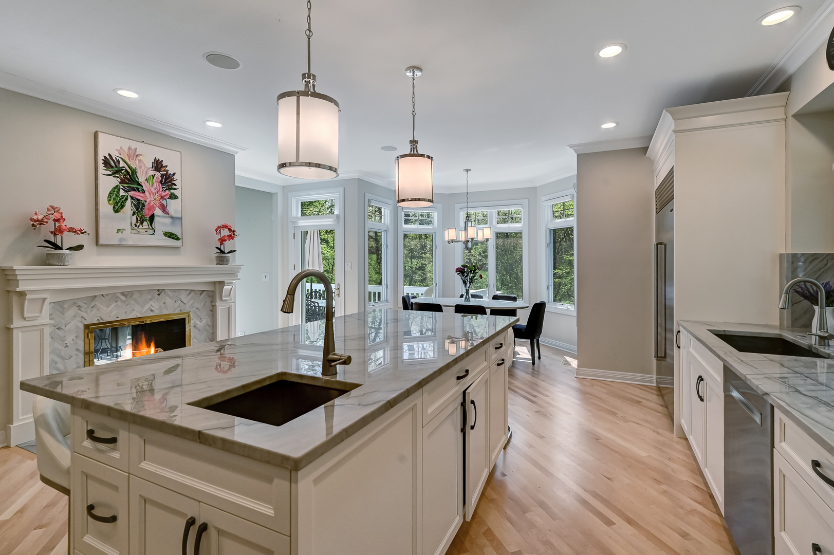9301 Falling Waters Drive East Burr Ridge, IL 60527 - Photo 17 of 52 a kitchen with granite countertop a stove a sink a refrigerator and a wooden floor