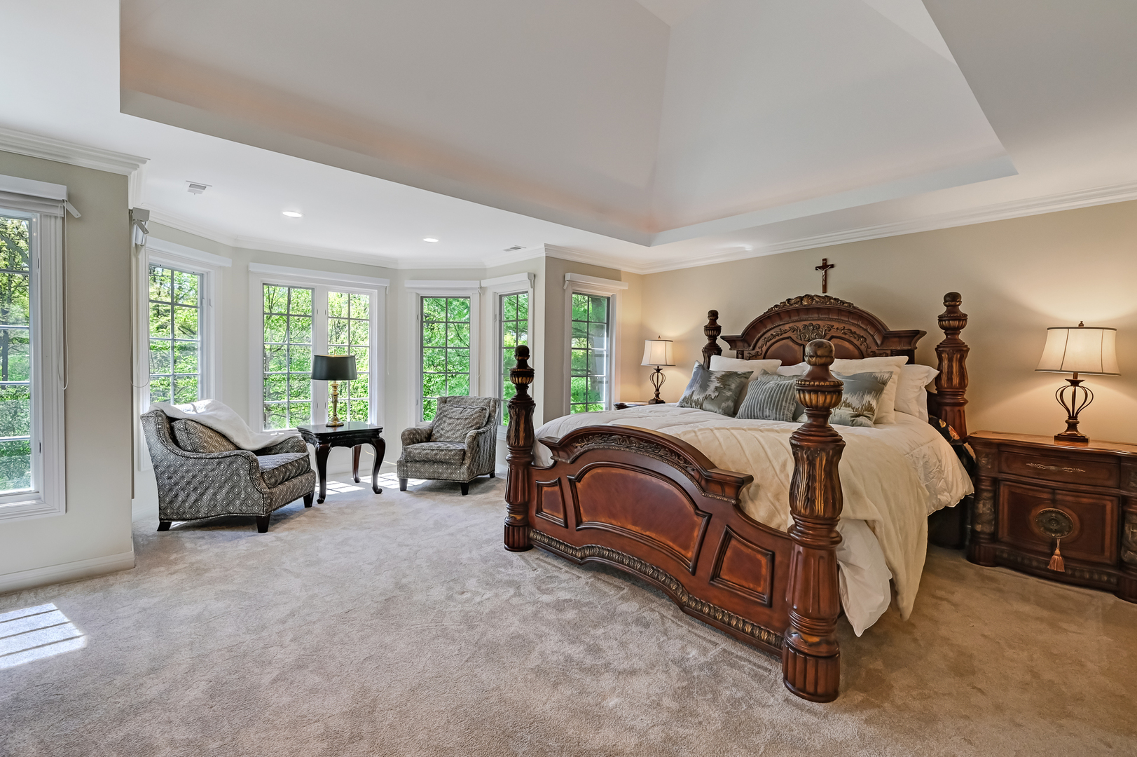 9301 Falling Waters Drive East Burr Ridge, IL 60527 - Photo 22 of 52 a bedroom with a bed and a large window