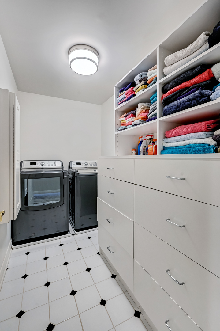 9301 Falling Waters Drive East Burr Ridge, IL 60527 - Photo 26 of 52 a utility room with cabinets