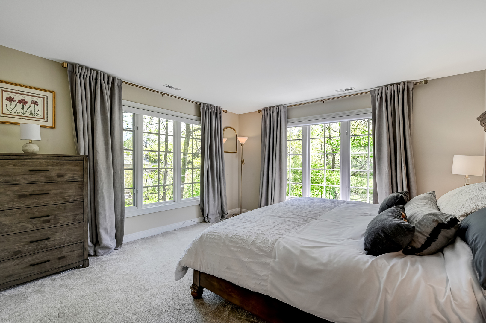 9301 Falling Waters Drive East Burr Ridge, IL 60527 - Photo 31 of 52 a bed sitting in a spacious bedroom next to a window